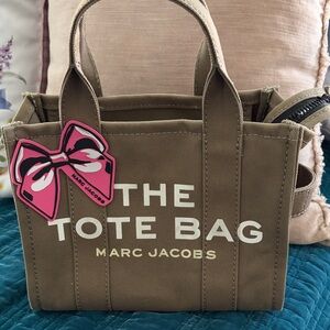 Marc Jacobs olive green Canvas Mini Tote with Marc Jacob’s Pink Bow patch